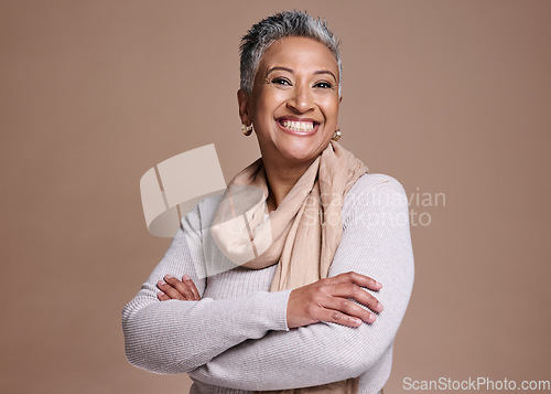 Image of Happy elderly woman, smile and arms crossed in satisfaction for dental care against a studio background. Portrait of senior female smiling with teeth for oral, mouth or gum care hygiene on mockup