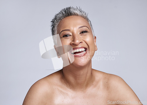 Image of Skincare, glow and senior woman in a studio portrait happy with facial cosmetics, healthy skin and natural makeup for retirement wellness. Smile face of an elderly or old woman model for dermatology