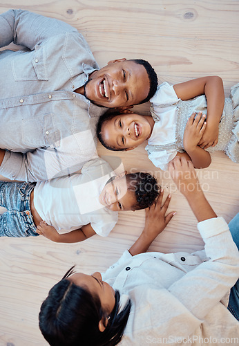 Image of Family, love and relax on floor together at home for quality time, care or support relationship bonding. Happy family, mom play and comic children smile, laughing and fun for freedom and happiness