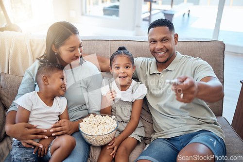 Image of Parents, kids and happy family watching tv, movie and media, tv show and cartoon film in home lounge, living room sofa and house. Happy family relax with popcorn, television streaming and multimedia