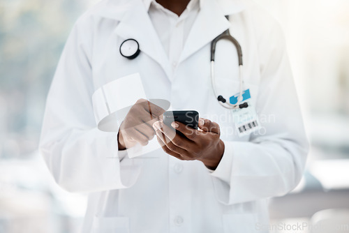 Image of Doctor, hand and phone browsing the internet for medical reseacrch in a healthcare clinic for medicine. Wifi, social media and online search of cardiologist for examination treatment or cure