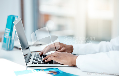 Image of Laptop, doctor and hands typing an email with medical research from hospital survey data results or feedback. Digital, keyboard and healthcare worker networking online after writing a science report