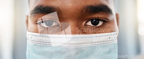 Image of Black man, covid face mask and medical doctor eyes for facial protection from disease, bacteria and germs in hospital. Healthcare safety policy, wellness compliance and covid 19 virus health security