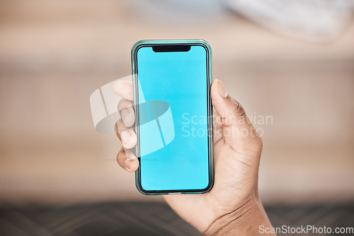 Image of Green screen, phone and mockup in hand of man showing marketing logo, contact us or brand on smartphone with ux UI advertising design. Blue screen 5g smartphone for communication and networking space