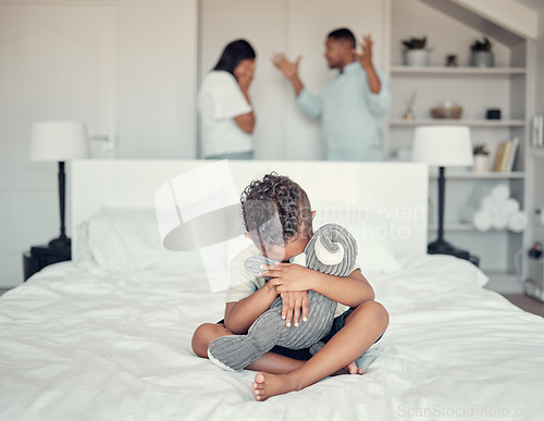 Image of Sad, fight and boy on the bed with parents in conflict depression, anxiety and stress in their family home. Fear, scared and child with a teddy bear hug while mother and father talk about divorce