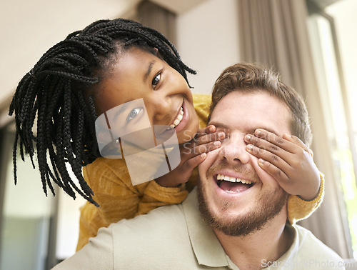 Image of Adopted child, man or father bonding in fun game in house living room, hotel or family home in hide and seek activity, love and trust. Portrait, smile or playful black girl with foster support parent