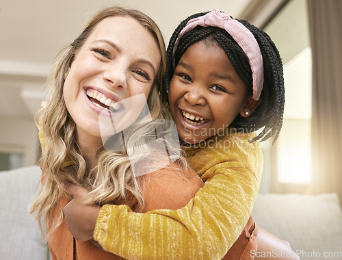 Image of Portrait, love and family with an adopted girl and foster mother bonding in the living room of their home. Face, smile and piggyback with a woman and daughter in their house together with a smile