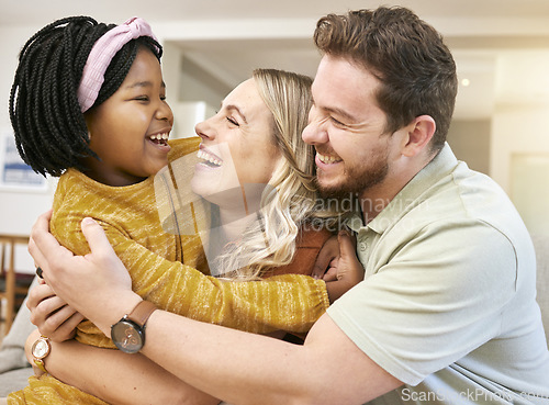 Image of Adoption, love and family hug in home, bonding and having fun. Support, care and father, mother and foster child or black girl hugging, embrace or cuddle and enjoying quality time together in house.