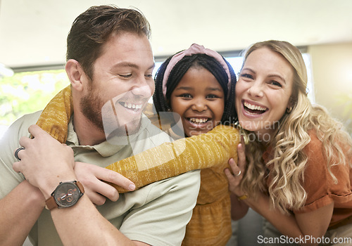 Image of Family, children and adoption with a girl, mother and father bonding in the living room of their home. Portrait, love and smile with happy foster parents and black daughter together in a house