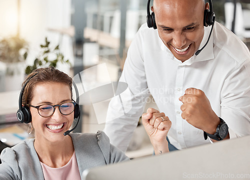 Image of Call center, celebration and team happy about success, target and sales of a consultant in training with her mentor, coach or manager. Man and woman in telemarketing, CRM and customer service office