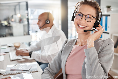Image of Call center, happy and consultant portrait in office for telemarketing, communication and contact us query. Working, online and customer service woman ready for call in corporate workplace.
