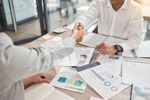 Image of Marketing, documents and business people handshake in office for deal or onboarding interview. Partnership, b2b and contract agreement, shaking hands and thank you, negotiation and welcome to company