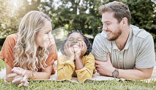 Image of Family, diversity and children with foster parents and adopted daughter together in a park during summer. Kids, love and adoption with a mother, father and happy girl bonding outdoor in nature