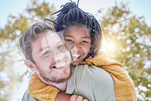 Image of Family, happiness and adoption with a father and child outdoor with trust for piggy back ride for love and support with a smile in summer. Portrait of a man and foster kid in a nature park for fun