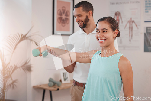 Image of Physiotherapy, dumbbell exercise and woman with doctor for rehabilitation, recovery or wellness after sports injury. Physical therapy, accident and man helping female patient with weight training.