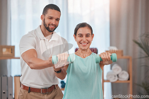 Image of Fitness, personal trainer and woman with weights in home doing exercise, workout and training in living room. Health, wellness and female with male instructor doing weightlifting with dumbbells