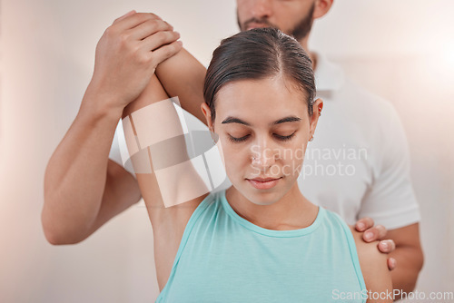 Image of Physiotherapy, woman and stretching arm with coach for fitness healthcare or sports wellness. Rehabilitation recovery, personal trainer and orthopedic physical therapy or physiotherapist help patient