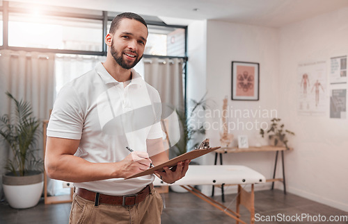 Image of Wellness, health and happy physiotherapy portrait in professional workspace with notes clipboard. Rehabilitation, reflexology and expert therapy man in office for body trauma evaluation.