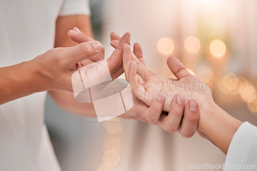Image of Health, hands and reiki massage of a spa therapist consultation or couple showing support. Relax, wellness and physiotherapy peace of a hand together with zen and healthy physical therapy with care