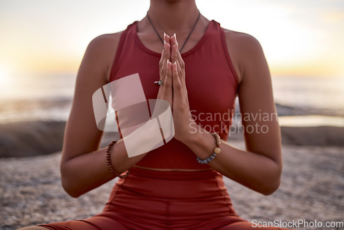 Image of Hands, woman and yoga for meditation, zen balance and exercise with focus. Calm fitness girl with workout in Hawaii with mindfulness, body and wellness training at the ocean during sunset in summer