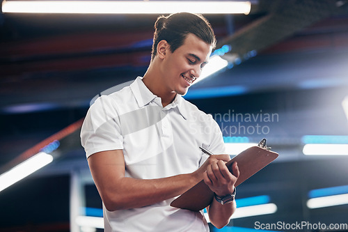 Image of Personal trainer, coach and man writing on clipboard for gym membership, sign up and information for subscription with a smile. Happy male worker with paper for checklist, schedule or workout plan