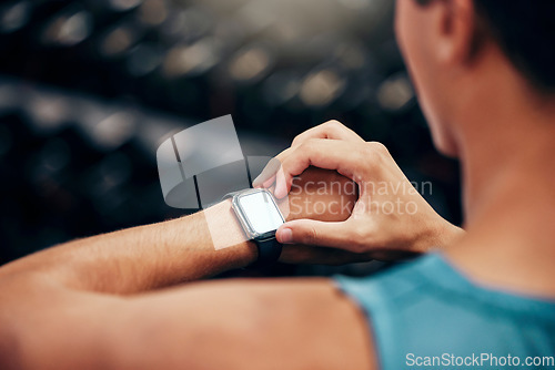 Image of Man, smartwatch and closeup of app for health, wellness and fitness while running, exercise or workout. Runner, smart watch or time on digital tech for training, sport or cardio information on screen