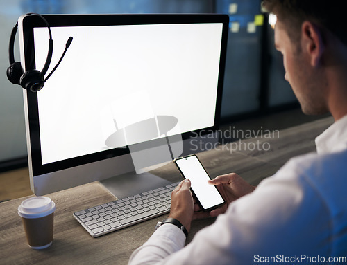 Image of Cellphone, call center and customer service with a man consultant typing a text message in a sales office. Contact us, crm and ecommerce with an employee using a smartphone, working in telemarketing