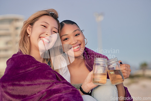 Image of Friends cheers, blanket and relax together in nature for quality time or freedom bonding outdoors. Girlfriends, happy and toasting happiness, love and celebration portrait for memories with drink