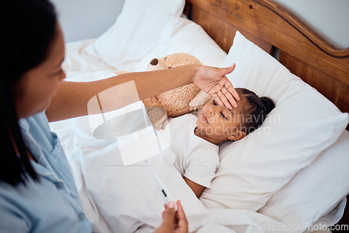 Image of Thermometer, fever and mom with sick girl lying in bed, touching forehead to feel body temperature. Family, healthcare and mother with young child in bedroom with cold, flu and covid symptoms at home