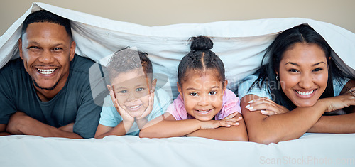 Image of Love, bed and portrait of family with blanket spending quality time, bonding and having fun on weekend. Happiness, black family and mother with dad and children posing in bedroom to relax in morning