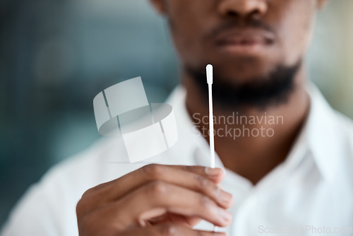 Image of Doctor, hands and covid test swab for appointment, examination or results for healthcare at the hospital. Hand of medical professional holding nasal pcr sample for testing corona virus or diagnosis