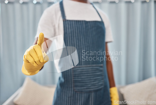 Image of Cleaner, hand or finger in virus stop, hygiene maintenance protocol or bacteria compliance rules of hotel, office building or home. Zoom, black man or cleaning service worker or safety control gloves