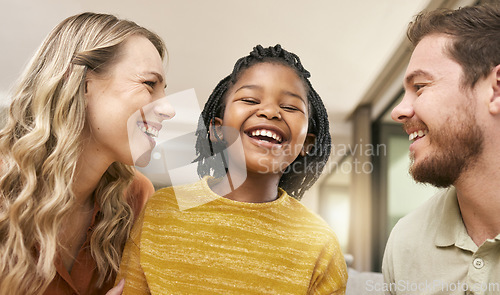 Image of Family, adoption and parents with girl in home having fun, laughing and bonding together on weekend. Love, multicultural and happy mom and dad with african american daughter relax in living room