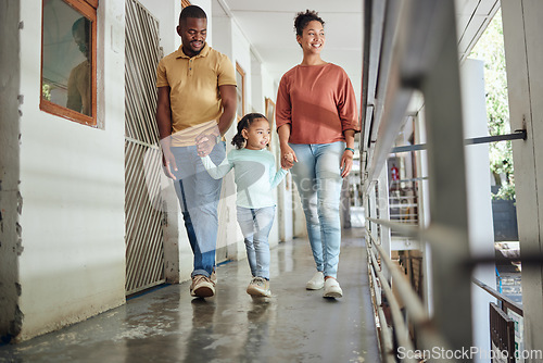 Image of Black family, parents or girl bonding in animal shelter, community volunteer charity or homeless pets center. Smile, happy child or holding hands and walking mother, father or rescue adoption kennel