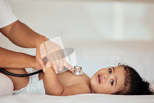 Image of Medical, consulting and stethoscope with baby on bed for healthcare, cardiology and pediatrician exam. Help, medicine and check with hands of doctor and heartbeat of child for growth, lungs or breath