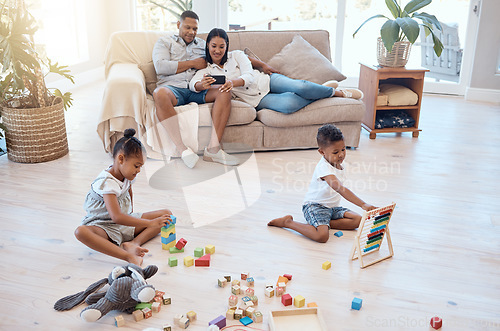 Image of Mother, father or children in house living room or Brazilian family home with phone movie streaming, toy building blocks and abacus math set. Man, woman or kids in relax game and education technology