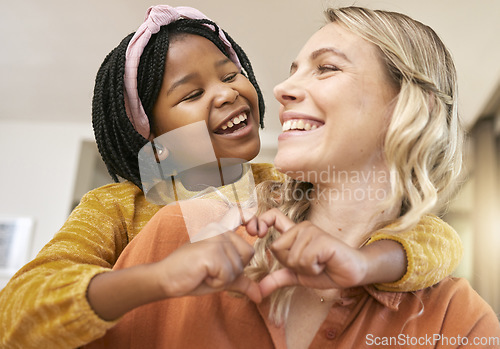 Image of Heart sign, adoption and mother with black girl, happy together for bonding, loving and smile. Love, foster mother and daughter being cheerful, happiness and joyful to celebrate adopted child in home