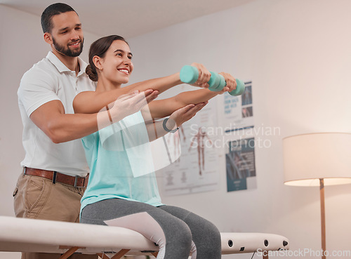 Image of Physical therapy, dumbbell and physiotherapist helping woman for muscle, fitness and body healthcare rehabilitation. Physiotherapy, patient and chiropractor support with stretching for sports injury