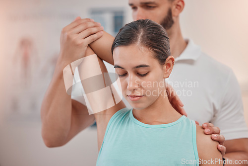Image of Physical therapy, woman patient and physiotherapy at a spa or clinic for chiropractic consultation. Spine health for consulting healthcare employee stretching a back problem for health and wellness