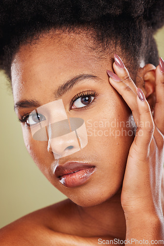 Image of Closeup beauty, portrait and skincare black woman in studio with soft, radiant and glow on skin. African, model and natural makeup on face for cosmetics, wellness and health against green background