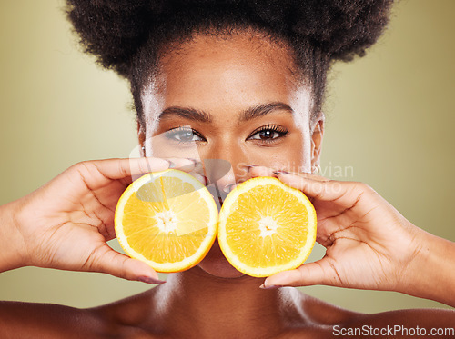 Image of Lemon, skincare and studio black woman with natural beauty benefits, healthy food and vitamin c promotion, marketing or advertising. African model face portrait, lime fruits and dermatology cosmetics