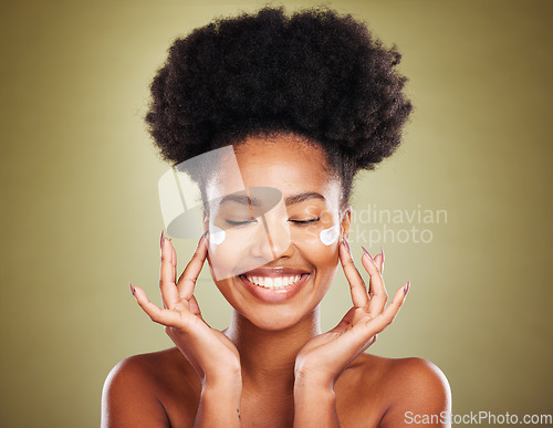 Image of Cream, face and skincare black woman in studio for beauty, skin glow and shine for wellness goals, results and benefits advertising. Happy african model with sunscreen product for dermatology facial