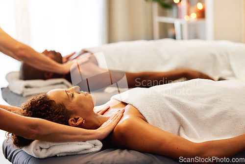 Image of Couple, massage and spa in relax for zen, comfort or stress relief together at a resort. Man and woman in luxury wellness and relaxation for physical therapy, hospitality or skincare at hotel salon