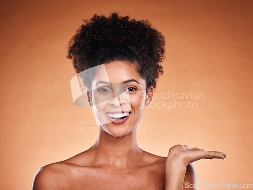 Image of Black woman, skincare and advertising mockup in studio portrait with glow, shine and beauty wellness. Happy model face and hand for product placement mock up marketing, advertising or promotion space