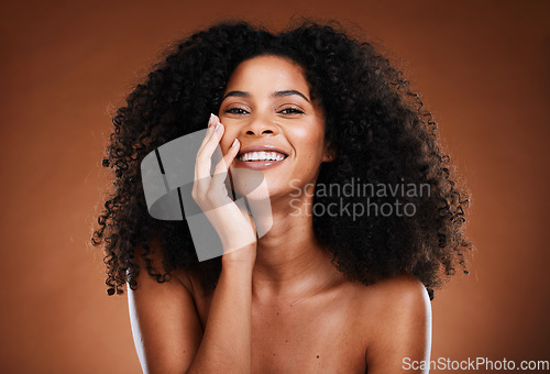 Image of Black woman, hair and portrait with natural beauty smile for healthy cosmetic satisfaction. Beautiful, confident and happy face of skincare girl with afro hair care texture in brown studio.