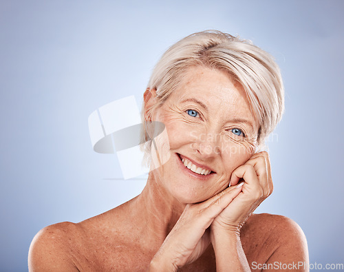 Image of Face portrait, makeup and senior woman in studio isolated on blue background. Skincare, beauty cosmetics or elderly female model from Australia happy for glowing and healthy skin after facial