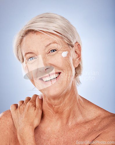 Image of Cream, skincare and portrait of senior woman in studio for cosmetics, beauty and face wellness promotion, marketing and advertising space. Elderly model facial sunscreen for dermatology or antiaging