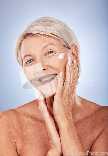 Image of Sunscreen, portrait and skincare senior woman in studio for beauty, skin healthcare and antiaging wellness. Elderly or old woman model cream product for facial, skin care or dermatology advertising
