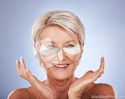 Image of Skincare, senior woman and eye patches for cosmetic, wellness and natural face routine in studio. Cosmetics, beauty and portrait of elderly lady with anti aging treatment isolated by gray background.