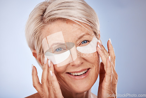 Image of Senior woman with collagen eyes mask for skincare, dermatology and facial wellness on studio mockup marketing or advertising space. Elderly model portrait and eye patches product for antiaging beauty